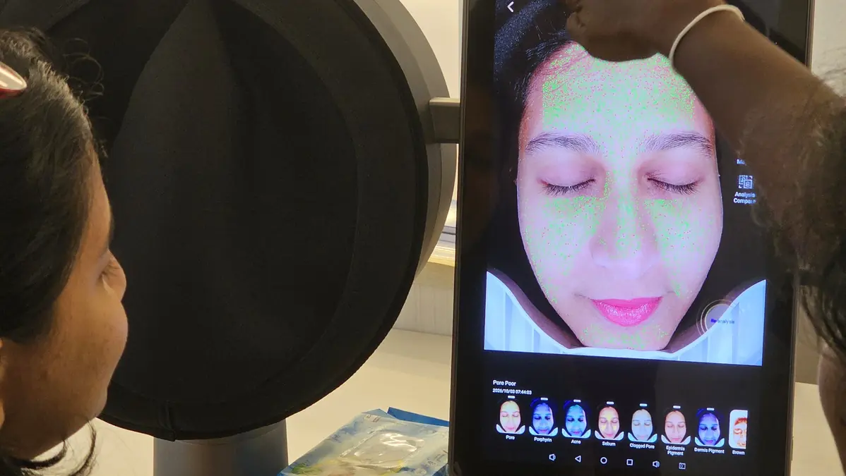 Doctor reviewing a digital skin analysis with a patient at Luméra Skin Clinic